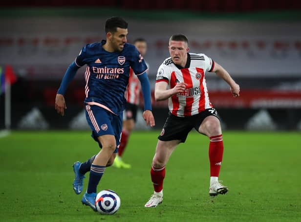 MOVING ON: Sheffield United's John Lundstram battles with Arsenal's Dani Ceballos in April this year. Picture: Simon Bellis/Sportimage