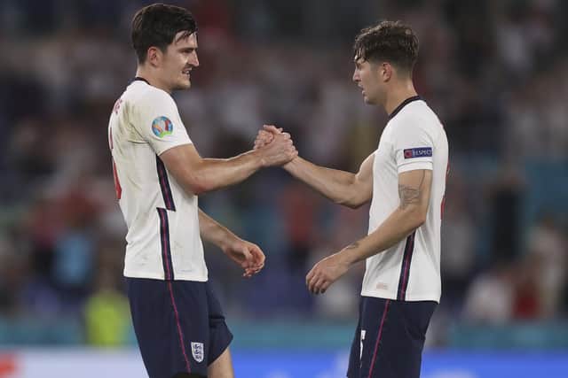 MAKING THE GRADE: England's Harry Maguire, left, congratulates John Stones after beating Ukraine in Rome. Picture: Lars Baron/AP