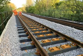 Library image of new sleepers being installed on Britain's mainline railway