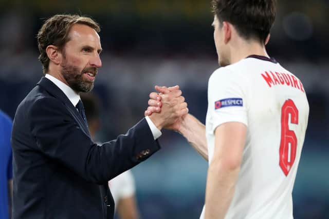 England manager Gareth Southgate shakes hands with Harry Maguire after the UEFA Euro 2020 Quarter Final match at the Stadio Olimpico, Rome. Picture: Nick Potts/PA Wire.