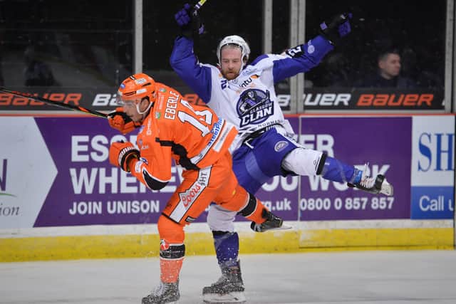 IMPACT PLAYER: Tanner Eberle makes his presence felt in an EIHL clash with Glasgow Clan. Picture: Dean Woolley.