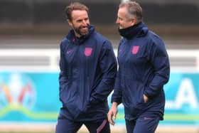 England manager Gareth Southgate and goalkeeping coach Martyn Margetson talk during training at St George's Park. (Photo by Catherine Ivill/Getty Images)