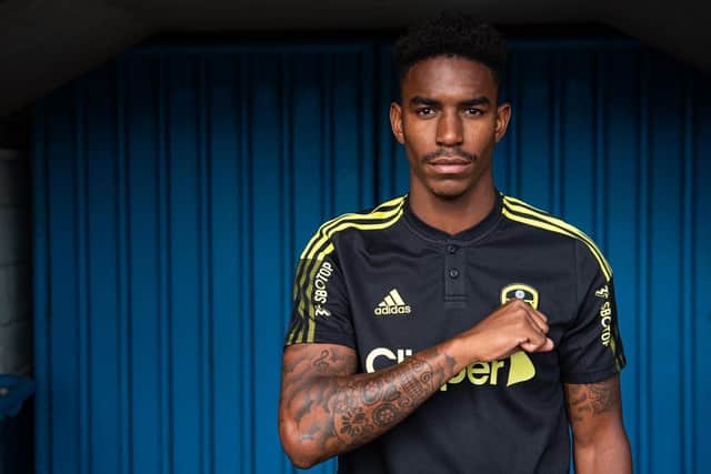Salute: Junior Firpo on signing for Leeds United (Picture: LUFC)