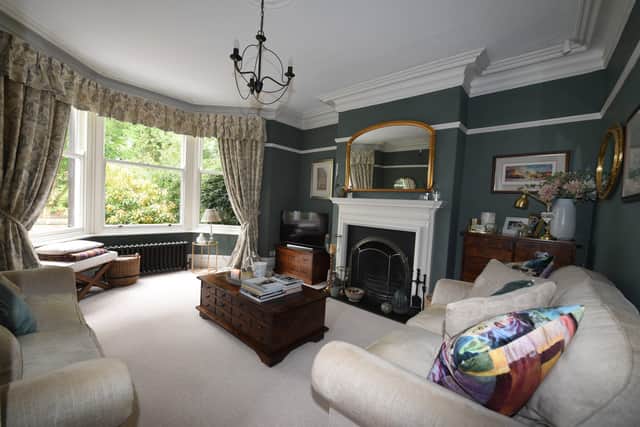 The living room walls are in Farrow & Ball Green Smoke.
 Picture Gerard Binks
