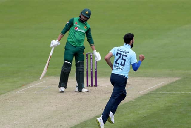 Career best: England's Saqib Mahmood celebrates as Pakistan's Faheem caught by John Simpson. Mahmood claimed his best international figures of 4-42 in Cardiff. Picture:   Bradley Collyer/PA Wire.