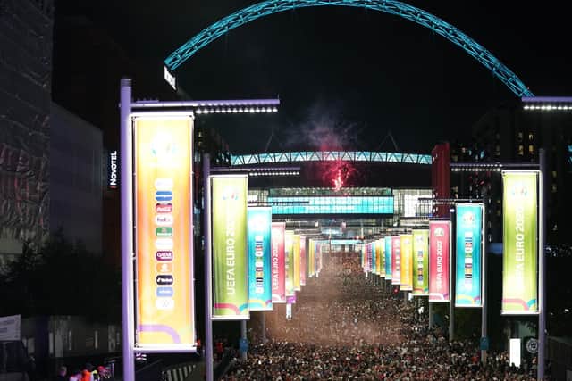 England fans leave Wembley Stadium, along Wembley Way after England qualified for the Euro 2020 final where they will face Italy on Sunday 11th July, following the UEFA Euro 2020 semi final match between England and Denmark. (Picture: Zac Goodwin/PA Wire)