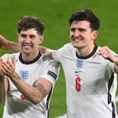 Harry Maguire and John Stones of England celebrate victory after the UEFA Euro 2020 Championship Semi-final match between England and Denmark. (Picture: Michael Regan - UEFA/UEFA via Getty Images)