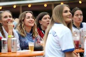 England fans watch the match at a pub in London as many venues see tables booked up in hours before Sunday's Euro final