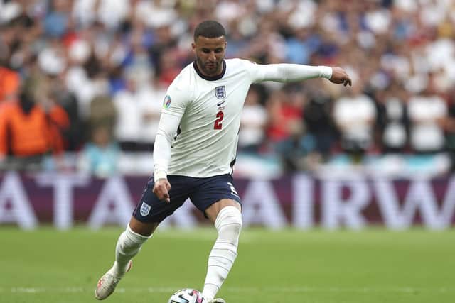 Kyle Walker passes the ball during the UEFA Euro 2020 Championship Semi-final match between England and Denmark. (Photo by Eddie Keogh - The FA/The FA via Getty Images)