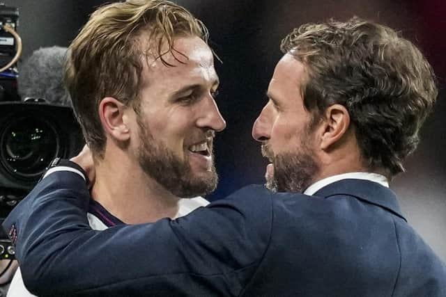 England's manager Gareth Southgate, right, and England's Harry Kane celebrate after winning the Euro 2020 soccer championship semifinal match against Denmark at Wembley. (AP Photo/Frank Augstein, Pool)