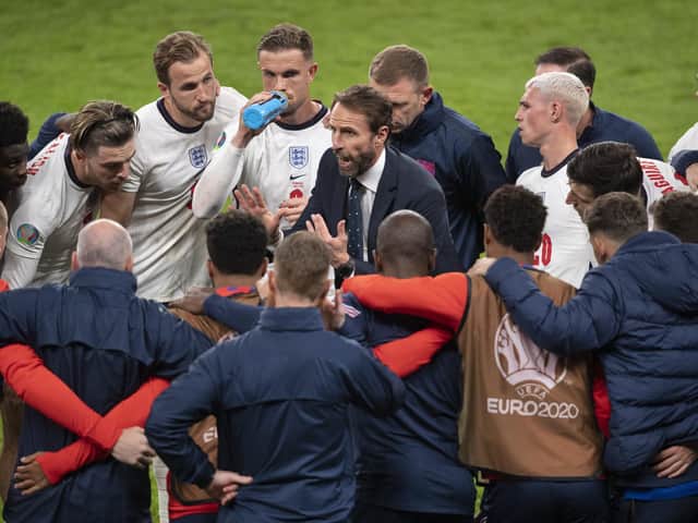 Gareth Southgate talks to his players during the half time break of extra time during the UEFA Euro 2020 Championship Semi-final match between England and Denmark. (Photo by Visionhaus/Getty Images)
