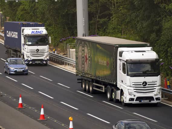 HGV lorries on the M4 motorway near Datchet, Berkshire. The Government has announced a temporary extension to lorry drivers' hours from Monday July 12th, amid a shortage of workers. Picture: Steve Parsons/PA Wire