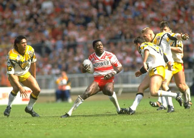 Martin Offiah of Wigan is surrounded by Castleford players during the Challenge Cup final at Wembley Stadium in London. Wigan won the match 28-12. (Picturet: Bob Martin/Allsport)
