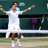 Still unbeatable: Novak Djokovic sinks to the floor at the moment of his sixth Wimbledon men’s singles victory and 20th garnd slam title, despite being pushed hard over four sets by Italian Matteo Berrettini in his first grand slam final. (Picture: Steve Paston/PA)
