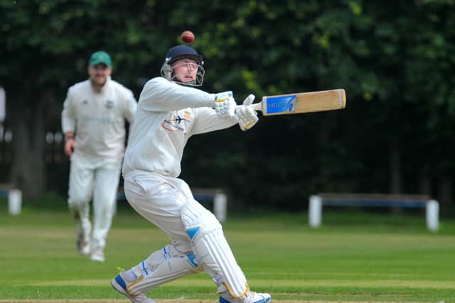 James Doidge hits a six for Rawdon, but they were to lose out against Otley in Aire Wharfe  Division 1
