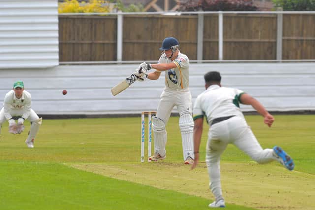 Pudsey St Lawrence's Josh Priestley cuts through point on his way to scoring 46 against Bradford Premier League rivals Wrenthorpe. Picture: Steve Riding.
