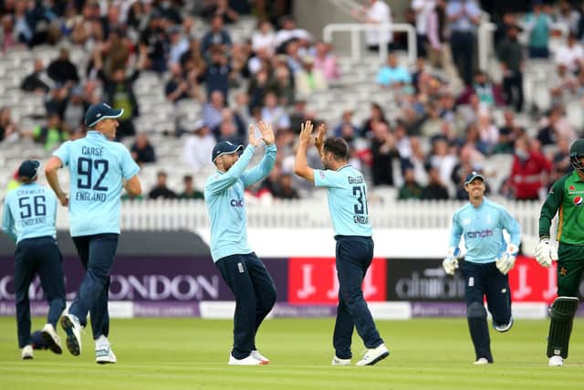 England's Lewis Gregory (centre) celebrates taking Pakistan's final wicket at Lord's. Picture: Nigel French/PA