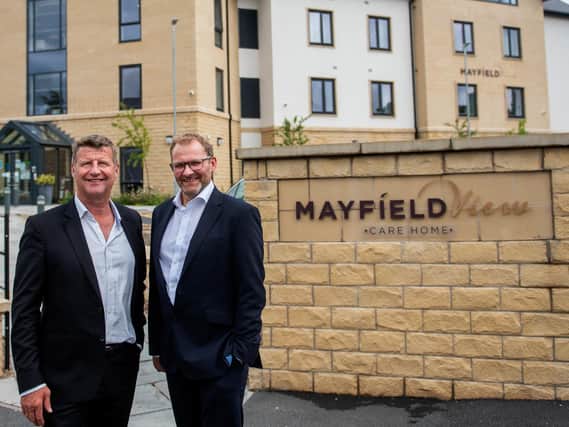 (from left) Springfield Healthcare Group CEO Graeme Lee with James Nightingale, a Partner at Ward Hadaway, outside Mayfield View care home in Ilkley.”