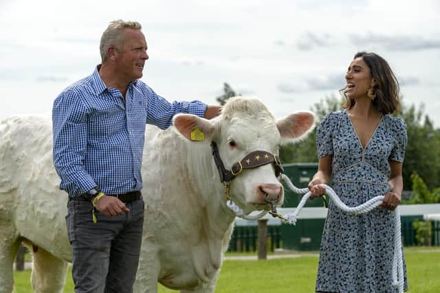 Anita Rani and Jules Hudson with a British Charolais belonging to Emma Andrews of Holmfirth, as they prepared to broadcast two-part TV series Today at The Great Yorkshire Show in 2019. Picture: Bruce Rollinson.