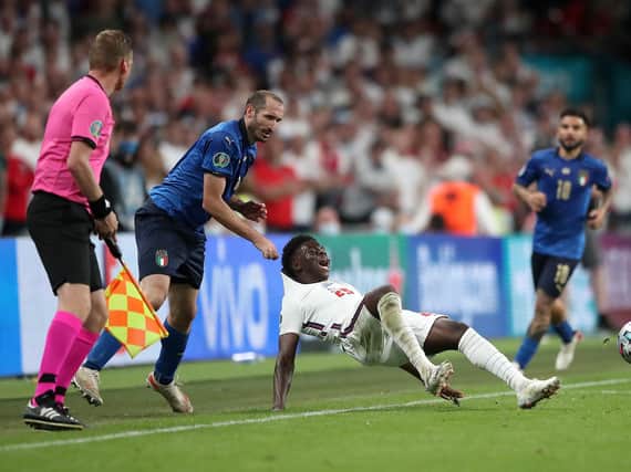 Italy captain Giorgio Chiellini was booked for his grab on Saka during the Euro 2020 final