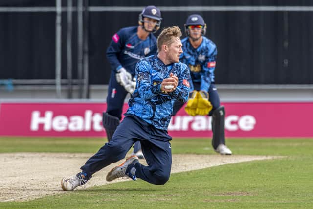 SPINNING AROUND: Yorkshire's Dom Bess brilliantly catches Derbyshire's Leus Du Plooy from his own bowling 
Picture: Tony Johnson