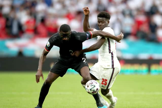 England's Bukayo Saka battles with Germany's Antonio Rudigerduring the UEFA Euro 2020 round of 16 match at Wembley. Picture: Nick Potts/PA