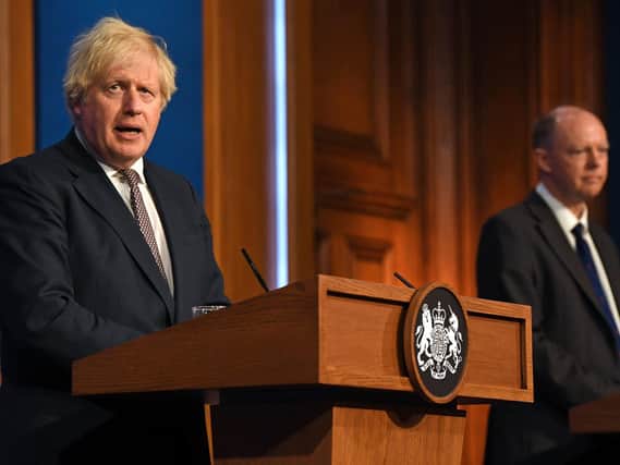 Prime Minister Boris Johnson and Chief Medical Officer Professor Chris Whitty during a media briefing in Downing Street, London, on coronavirus (Covid-19). Picture: Daniel Leal-Olivas/PA Wire