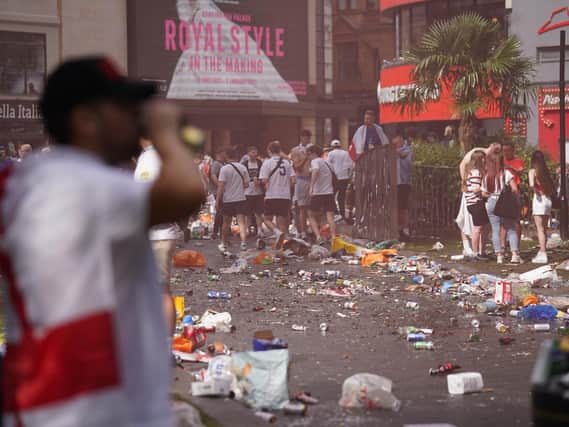 Piles of rubbish left behind by partying England fans in Leicester Square, central London, ahead of the England football team playing in the UEFA Euro 2020 Final. Picture: Andrew Matthews/PA Wire