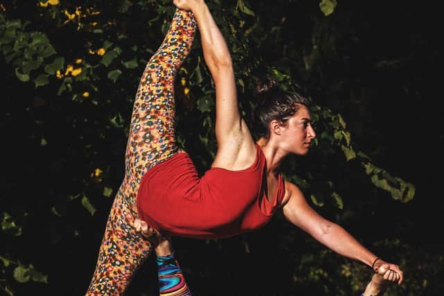 Dora Rubinstein balancing on her acrobatic partner Jade Clapham.             Pictures: Harry Hamburg