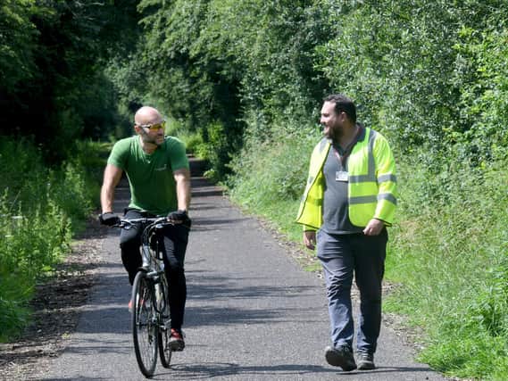 Lee Thompson, partnerships manager for Sustrans, with Damen Keddy, public rights of way officer at Barnsley Council on the Sustrans National Cycle Network near Worsbrough in Barnsley.