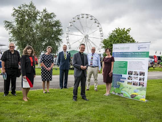 The North Yorkshire Rural Commissioners, pictured from left, Martin Booth, Debbie Trebilco, Jean McQuarrie, Sir William Worsley, the Dean of Ripon, John Dobson, Chris Clark and Sally Shortall at the Great Yorkshire Show in Harrogate. (Pic: Tony Johnson)