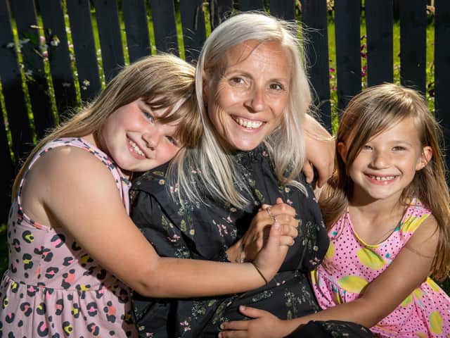 Helen Davy's daughters Annalise and Kairen are only eight and six