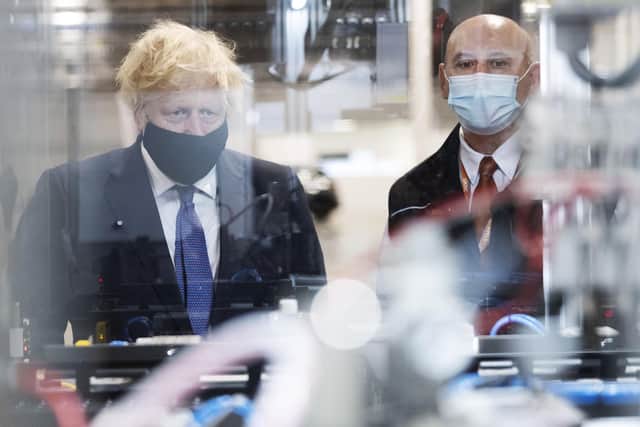 Prime Minister Boris Johnson (left) visits the UK Battery Industrialisation Centre in Coventry ahead of a speech in which he will insist his levelling-up agenda is "win win" and will not be a case of "robbing Peter to pay Paul" as tries to keep traditional Tories in the South on side. Picture date: Thursday July 15, 2021. Pic: PA
