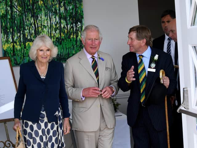The Prince of Wales and the Duchess of Cornwall, with Show Director Charles Mills. Picture: Simon Hulme