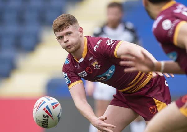 Family connection: Huddersfield's Oliver Russell started his career at Wigan, a club his father Richard also played for. Picture by Allan McKenzie/SWpix.com