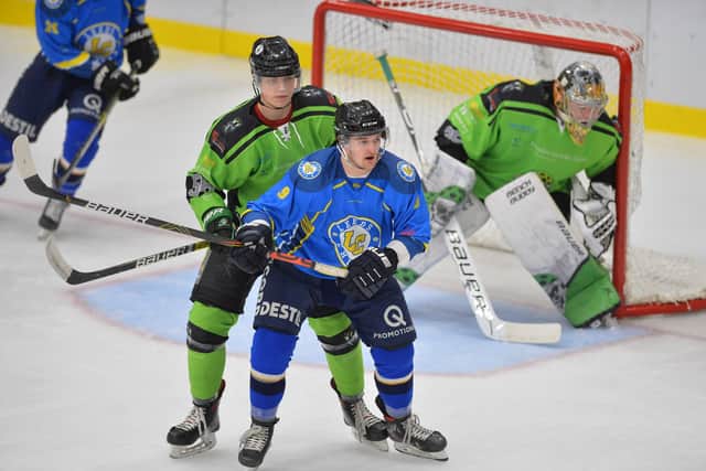 Leeds Chiefs' Joe Coulter and Hull's Thomas Stubley battle for position during a NIHL National clash in February 2020. Picture: Dean Woolley.