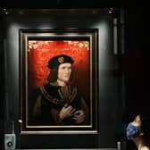Lucy Creighton, curator of archaeology at the Yorkshire Museum, with the famous late 16th century portrait of Richard III on display at the museum. (Jonathan Gawthorpe).
