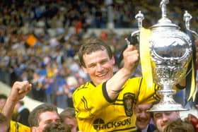 MAGIC MOMENT: Castleford's John Joyner holds the Challenge Cup trophy aloft after beating Hull KR in the final at Wembley Stadium in 1986. Picture: Bob  Martin/Allsport/Getty Images.
