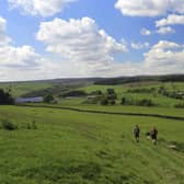 Pictued, walkers near Leighton Reservoir, Nidderdale, in North Yorkshire, England. The county has just been crowned the top adventure holiday destination for this year. Photo credit: stock.adobe