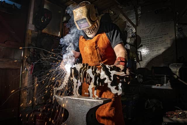 Michael at work in his forge in Lockton, North Yorkshire