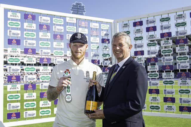 MAN OF THE MOMENT: England's Ben Stokes is congratulated with his man-of-the-match award by Yorkshire's Mark Arthur. Picture by Allan McKenzie/SWpix.com