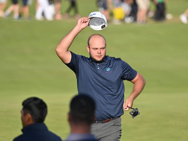Jonathan Thomson: Accepts the ‘roar’ of the crowd after acing the par-three 16th hole. (Picture: Getty)