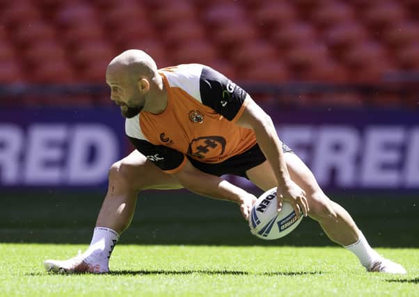 Pitching in: Castleford hooker Paul McShane gets feel for the Wembley pitch at yesterday's captain's run ahead of the Challenge Cup final. Picture by Allan McKenzie/SWpix.com