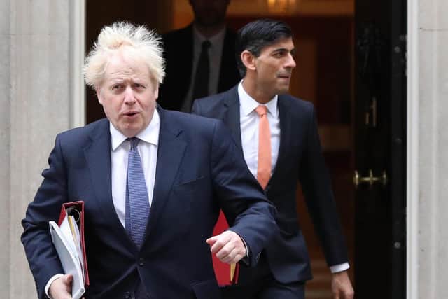 The Prime Minister and Chancellor, who are now self-isolating, were “pinged” by the test-and-trace system because of their contact with Health Secretary Sajid Javid. Pic: Jonathan Brady/PA Wire