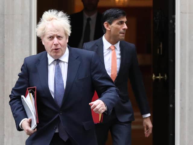 Prime Minister Boris Johnson and Chancellor Rishi Sunak pictured together in October 2020 (Jonathan Brady/PA)