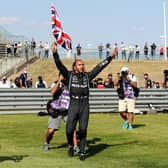 Mercedes' Lewis Hamilton celebrates after winning the British Grand Prix at Silverstone. Picture: Bradley Collyer/PA