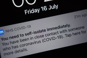 A notification issued by the NHS coronavirus contact tracing app - informing a person of the need to self-isolate immediately, due to having been in close contact with someone who has coronavirus (Yui Mok/PA)