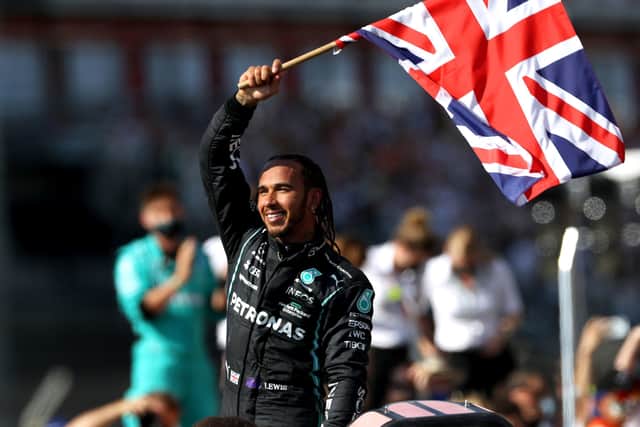 Mercedes' Lewis Hamilton celebrates after winning the British Grand Prix at Silverstone, Towcester. Picture: Bradley Collyer/PA