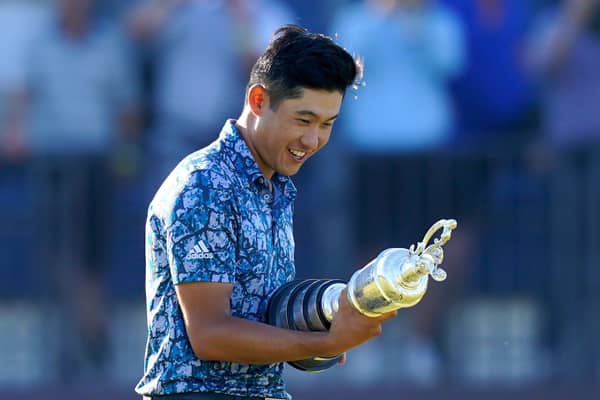MEMORABLE MOMENT: Collin Morikawa celebrates with the Claret Jug Trophy after winning The Open atRoyal St George's. Picture: Gareth Fuller/PA