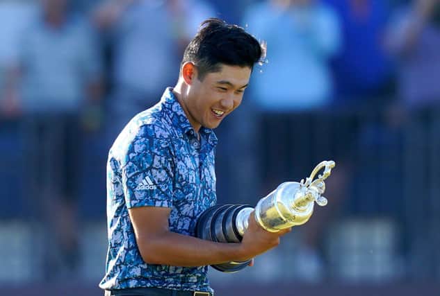 MEMORABLE MOMENT: Collin Morikawa celebrates with the Claret Jug Trophy after winning The Open atRoyal St George's. Picture: Gareth Fuller/PA